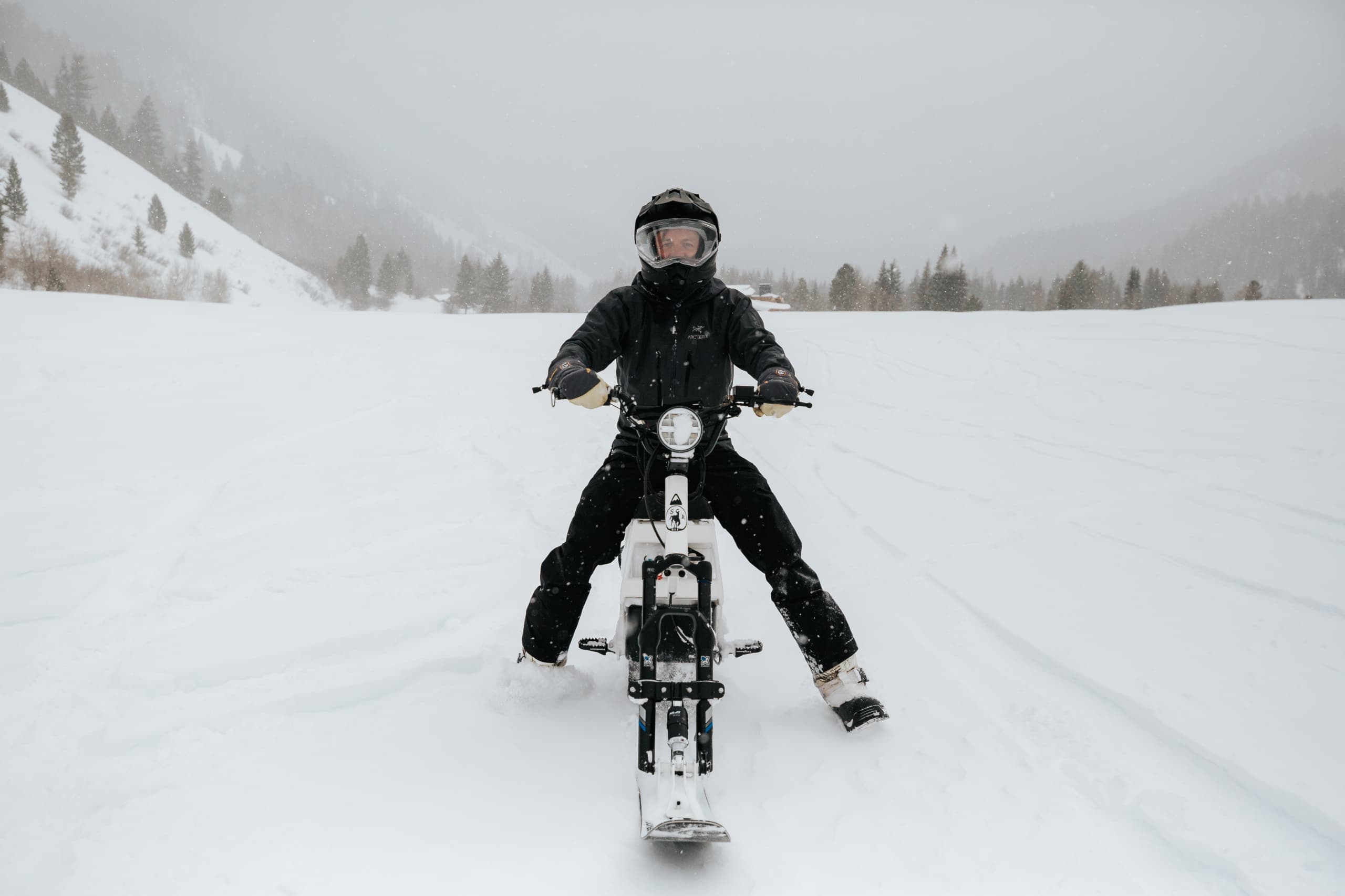 A person moonbiking through the snow in Jackson Hole, WY