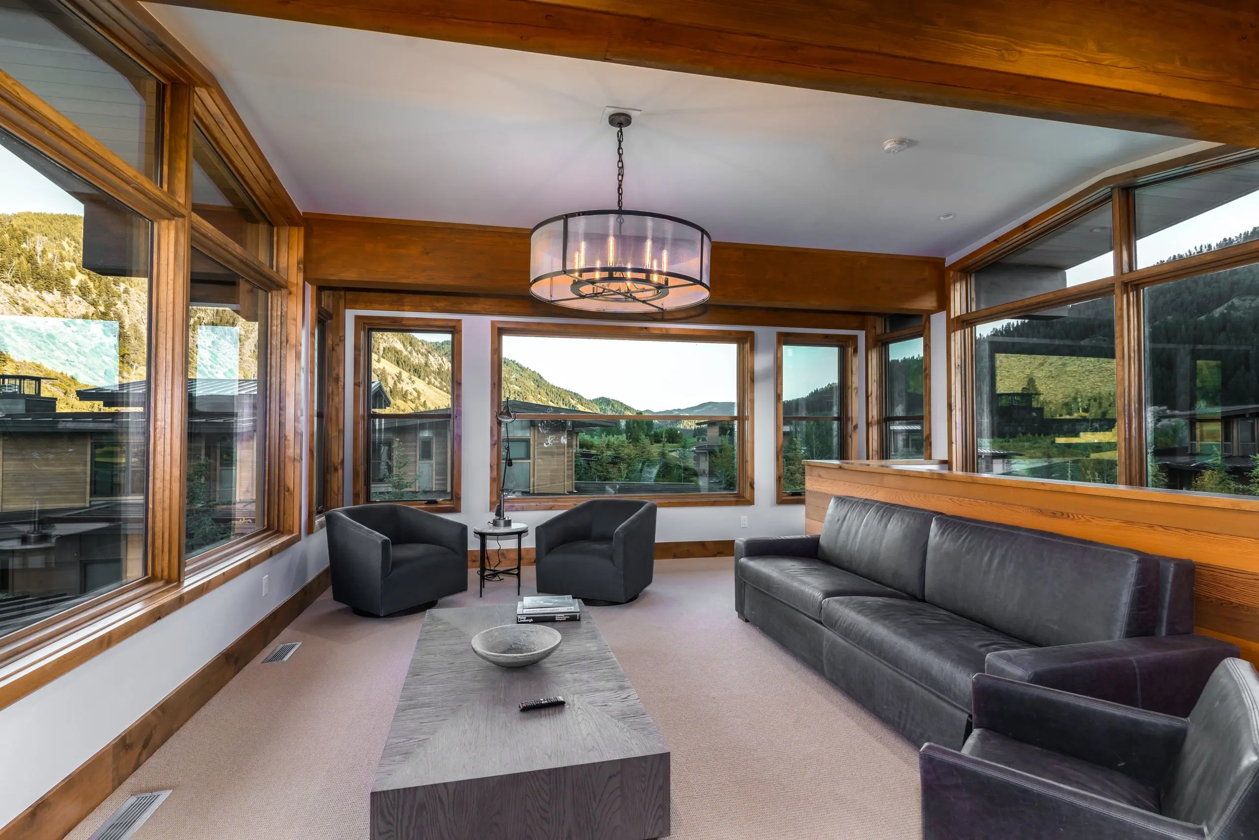Caddis Cabin living space with mountain views at Snake River Sporting Club