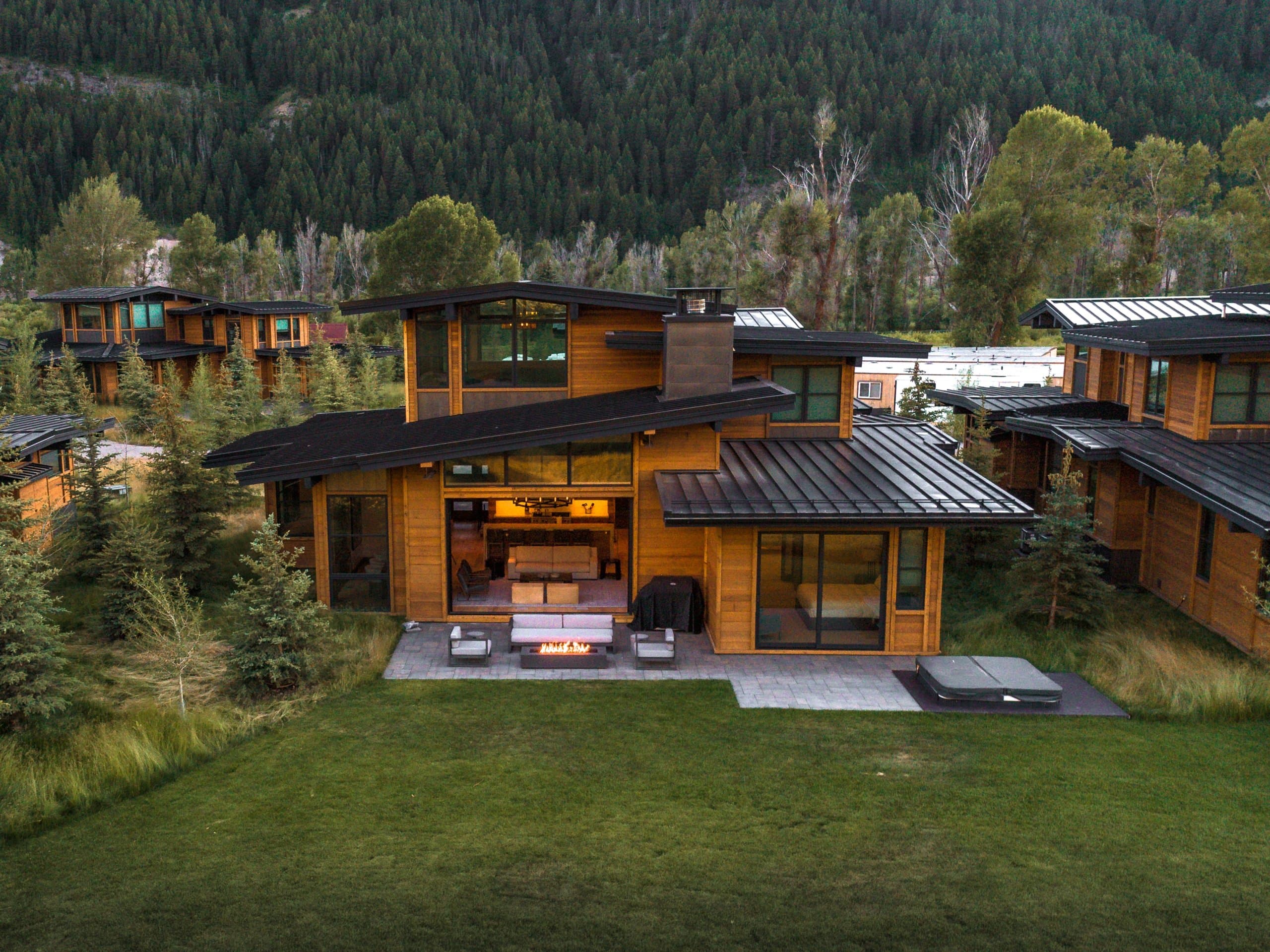 Snake River Sporting Club Caddis Cabins exterior at dusk
