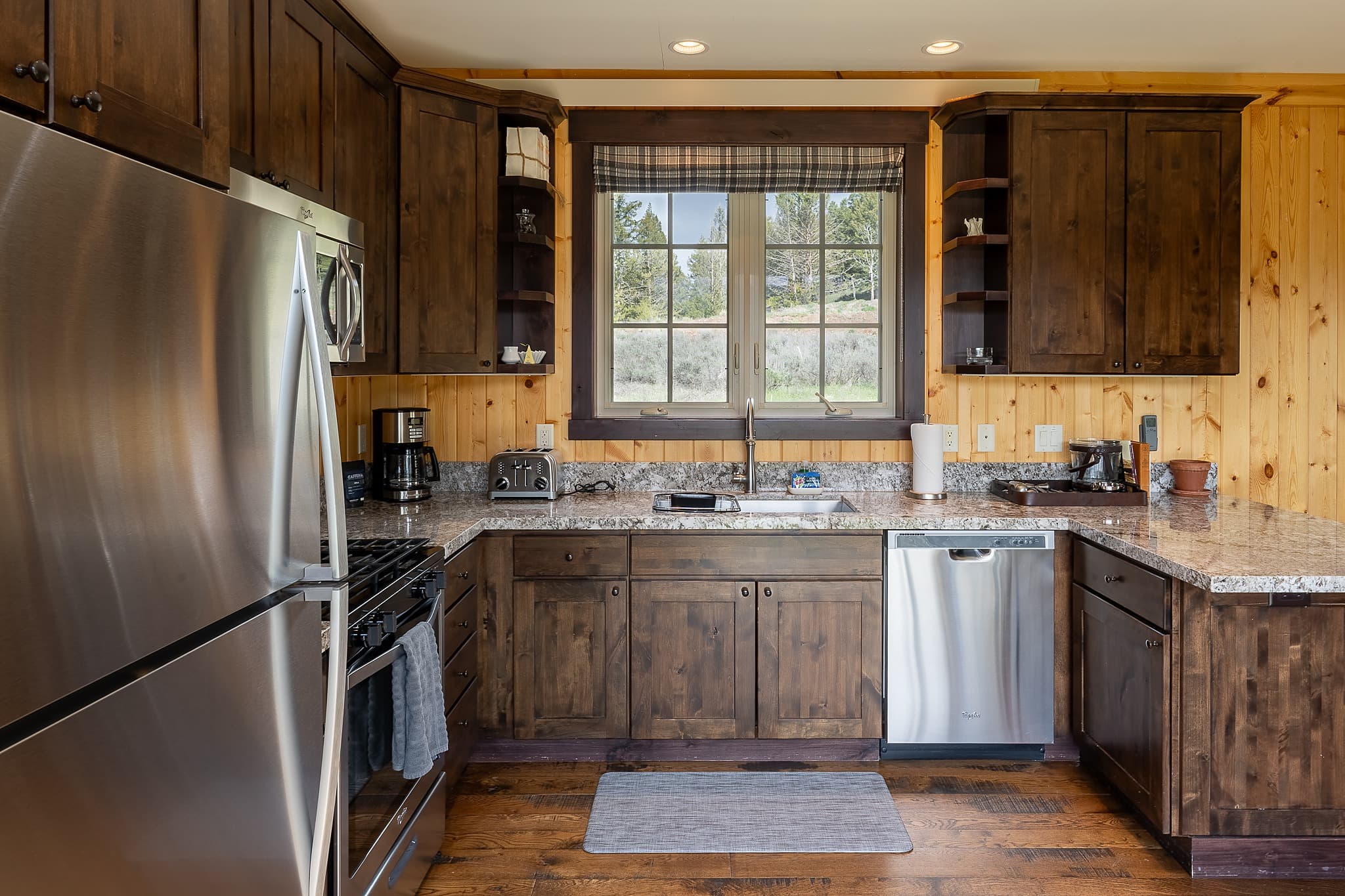 Fully equipped cabin kitchen at Snake River Sporting Club in Jackson Hole, Wyoming