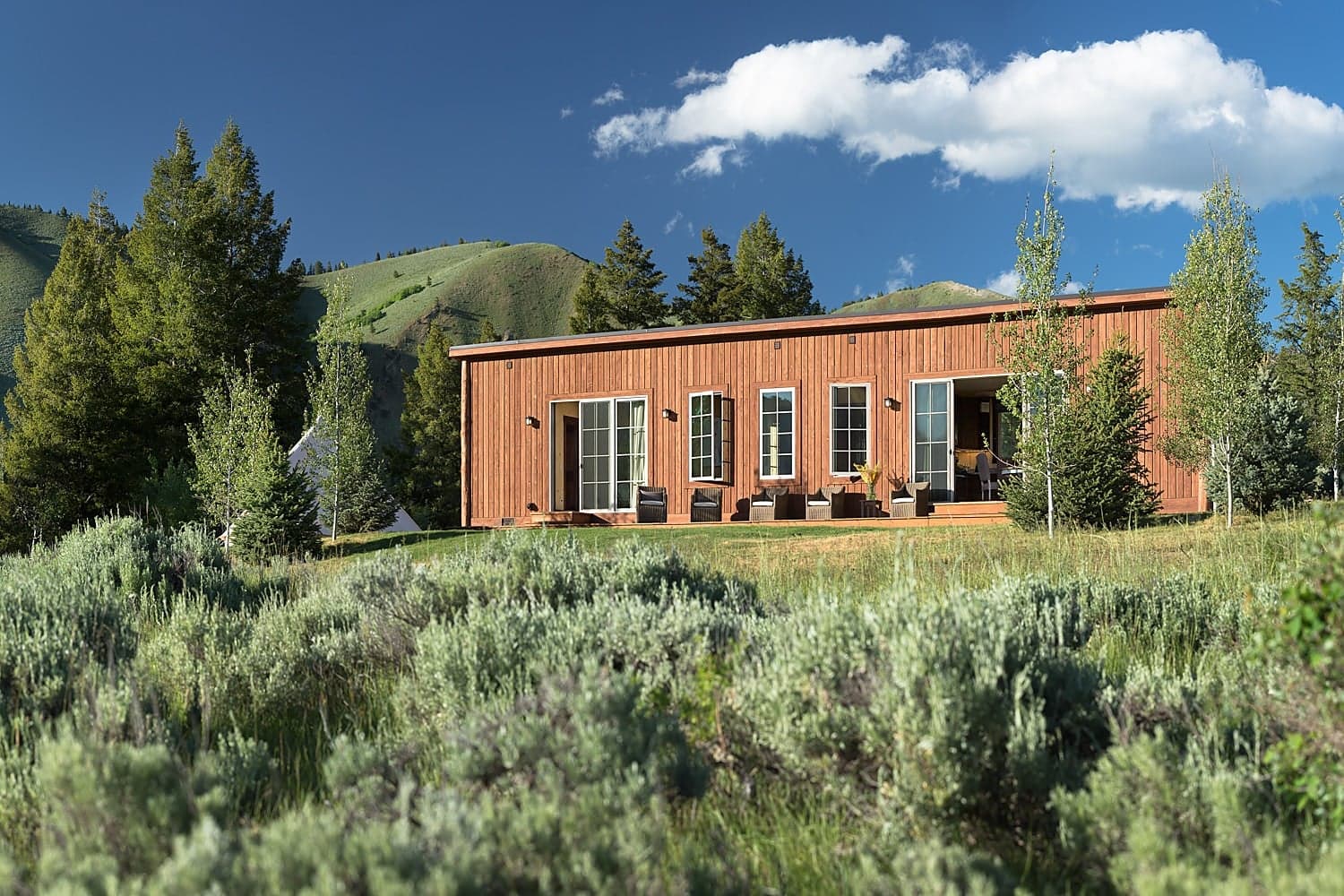 Hunting and fishing cabin exterior at Snake River Sporting Club in Jackson Hole, Wyoming