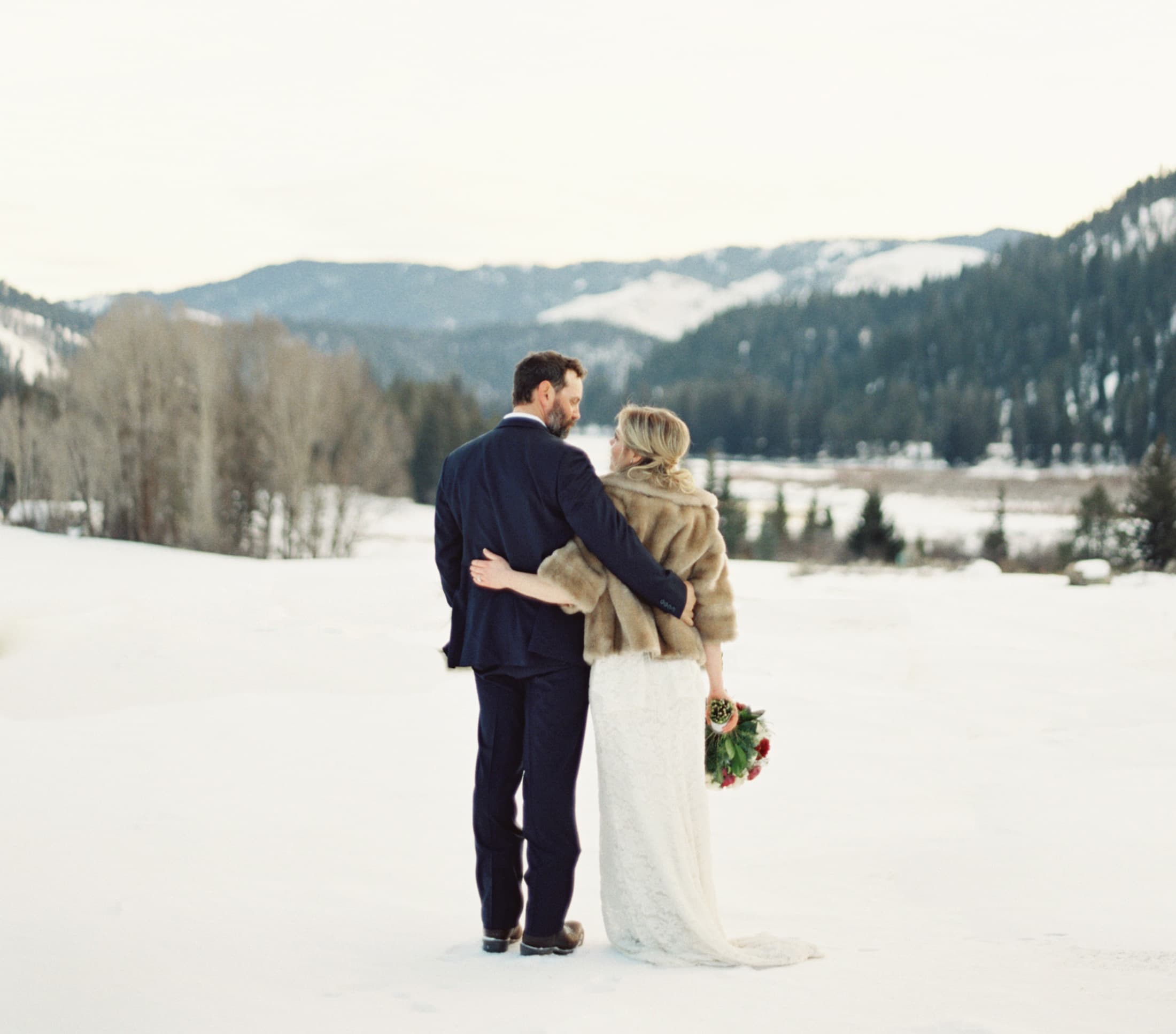 Bride And Groom In The Snow In The Tetons