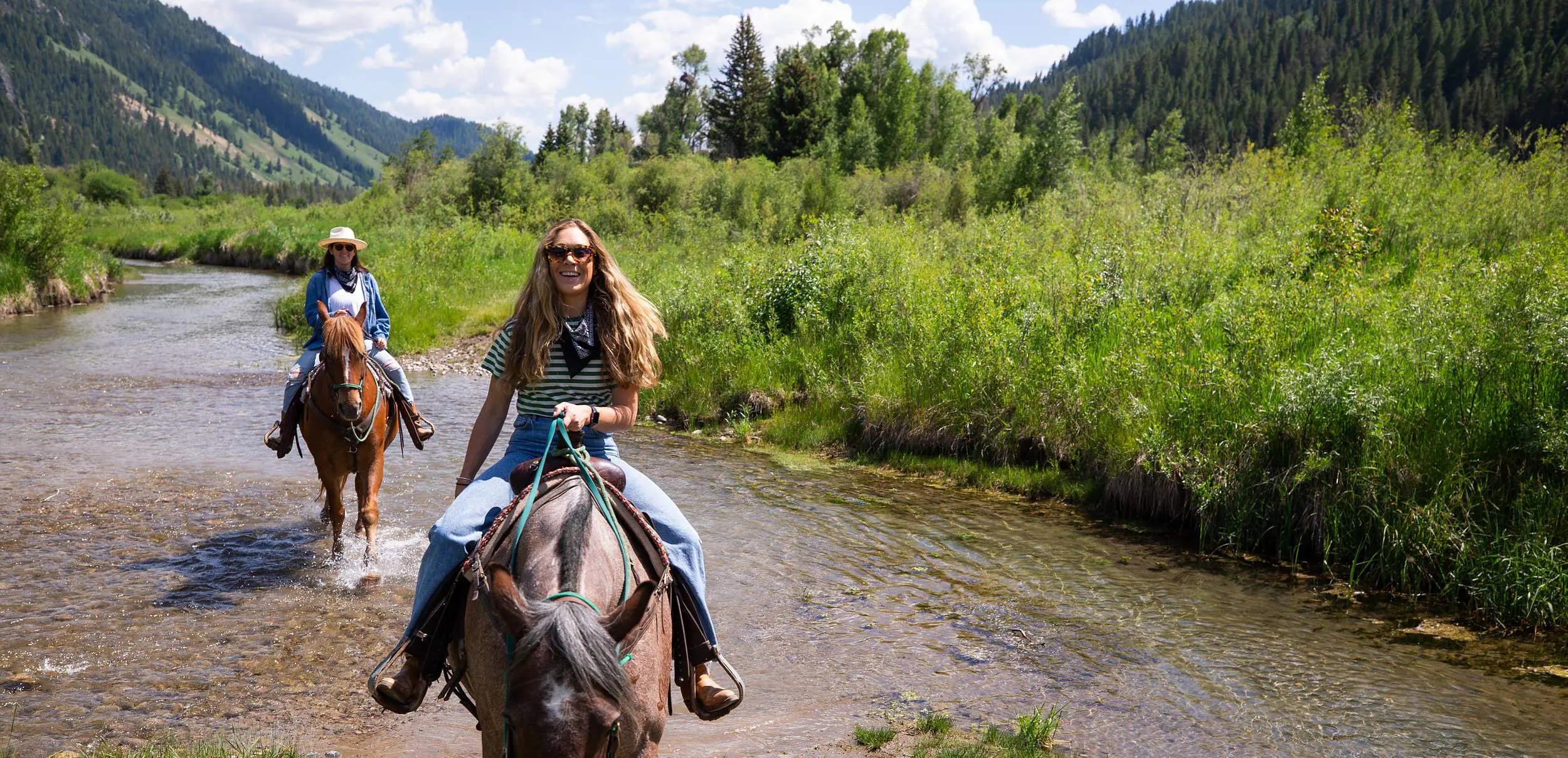 Two people on horseback